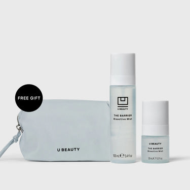 Three bioactive mist bottles in varying sizes with white caps alongside a light blue cosmetic pouch labeled "U Beauty."