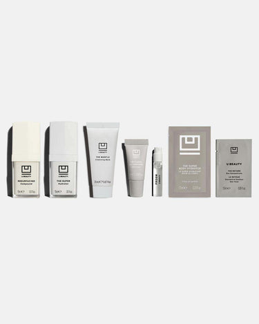 Six U Beauty skincare products arranged in a row: resurfacing compound, eye hydrator, cleansing balm, eye concentrate, primer