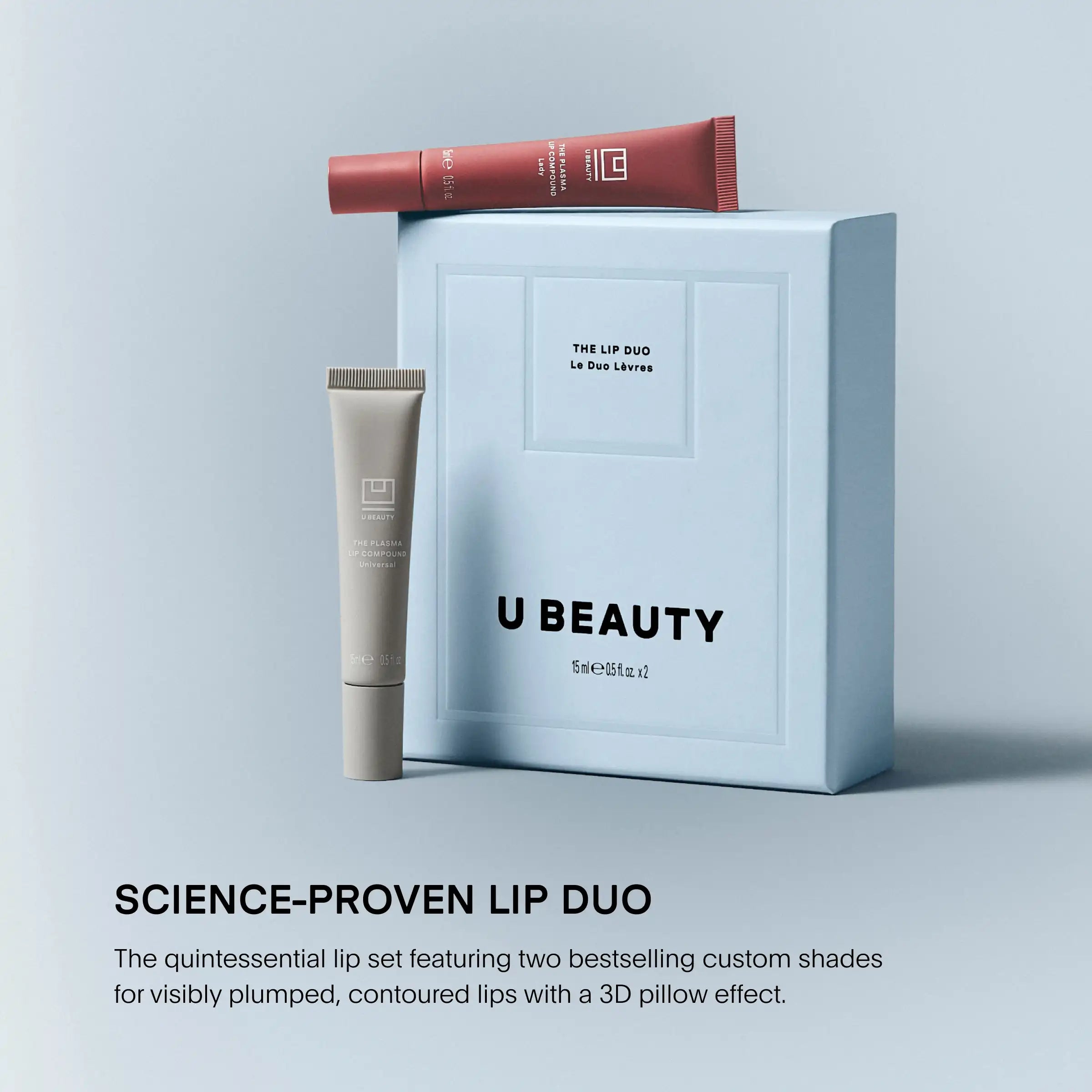 Two lip products displayed with light blue U Beauty branded box: burgundy tube applicator on top and beige lip balm tube besi