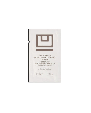 White sachet packet of The MANTLE Skin Conditioning Wash, 30ml, with brown logo and text on front.