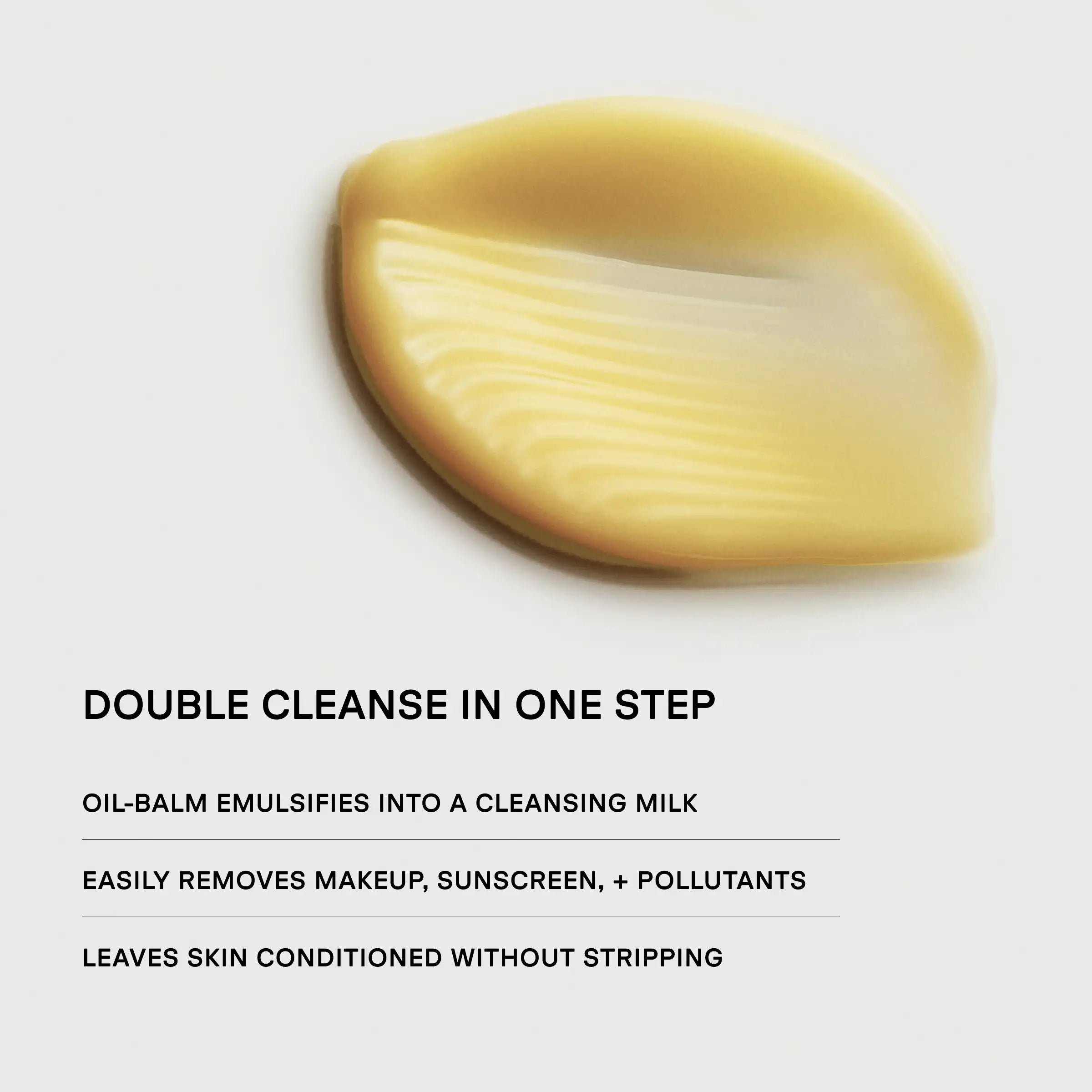 Yellow cleansing balm with streaked texture on neutral background.