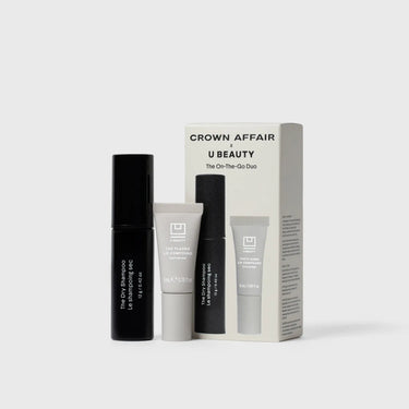 Crown Affair x U Beauty collaboration set containing four hair and lip care products in black and white packaging with gray b