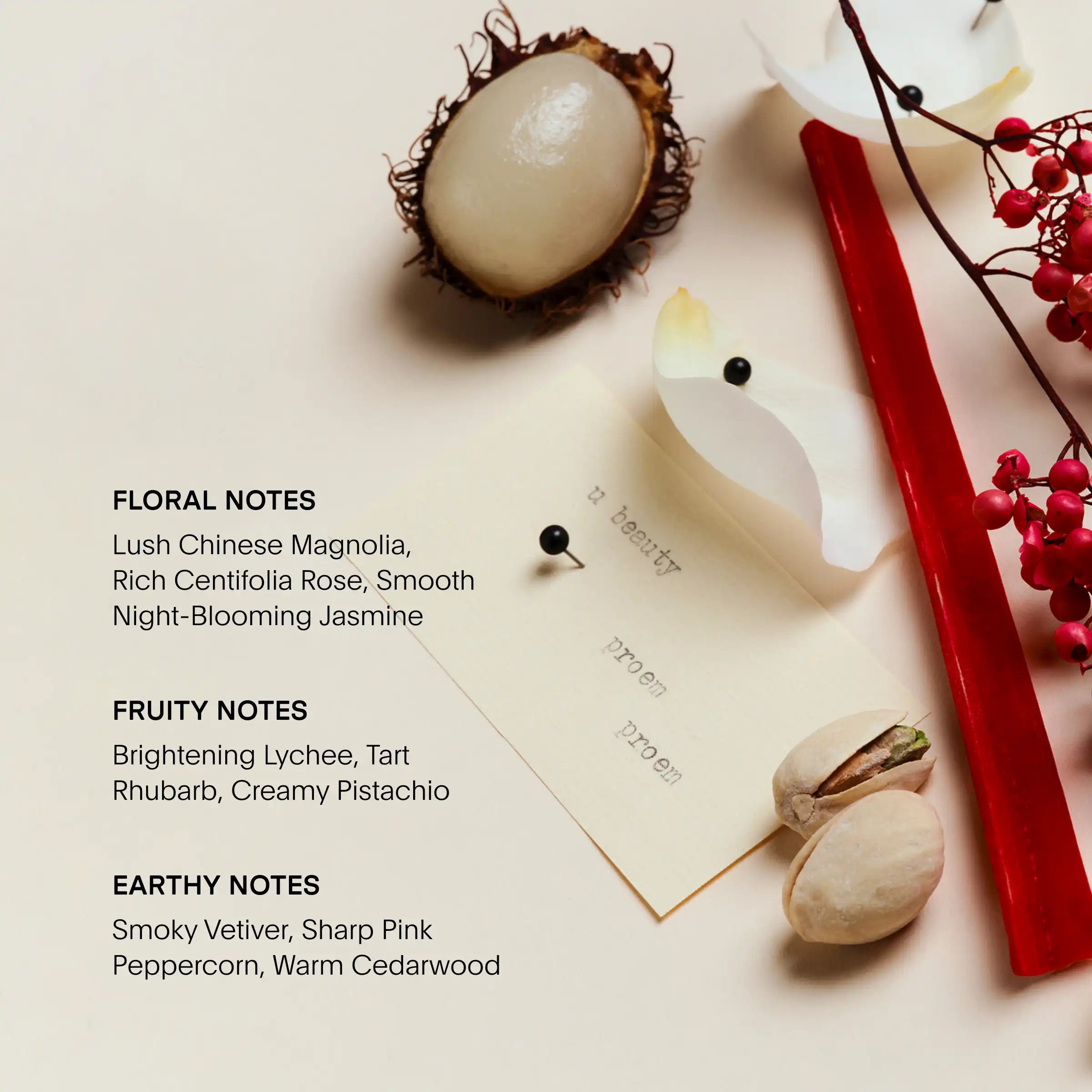 PROEM Eau de Parfum bottle surrounded by rambutan, red berries, pistachios, and ingredient cards on cream background.