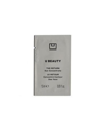 U Beauty The Return Eye Concentrate de 1,5 ml, envase gris con texto y logotipo en negro.