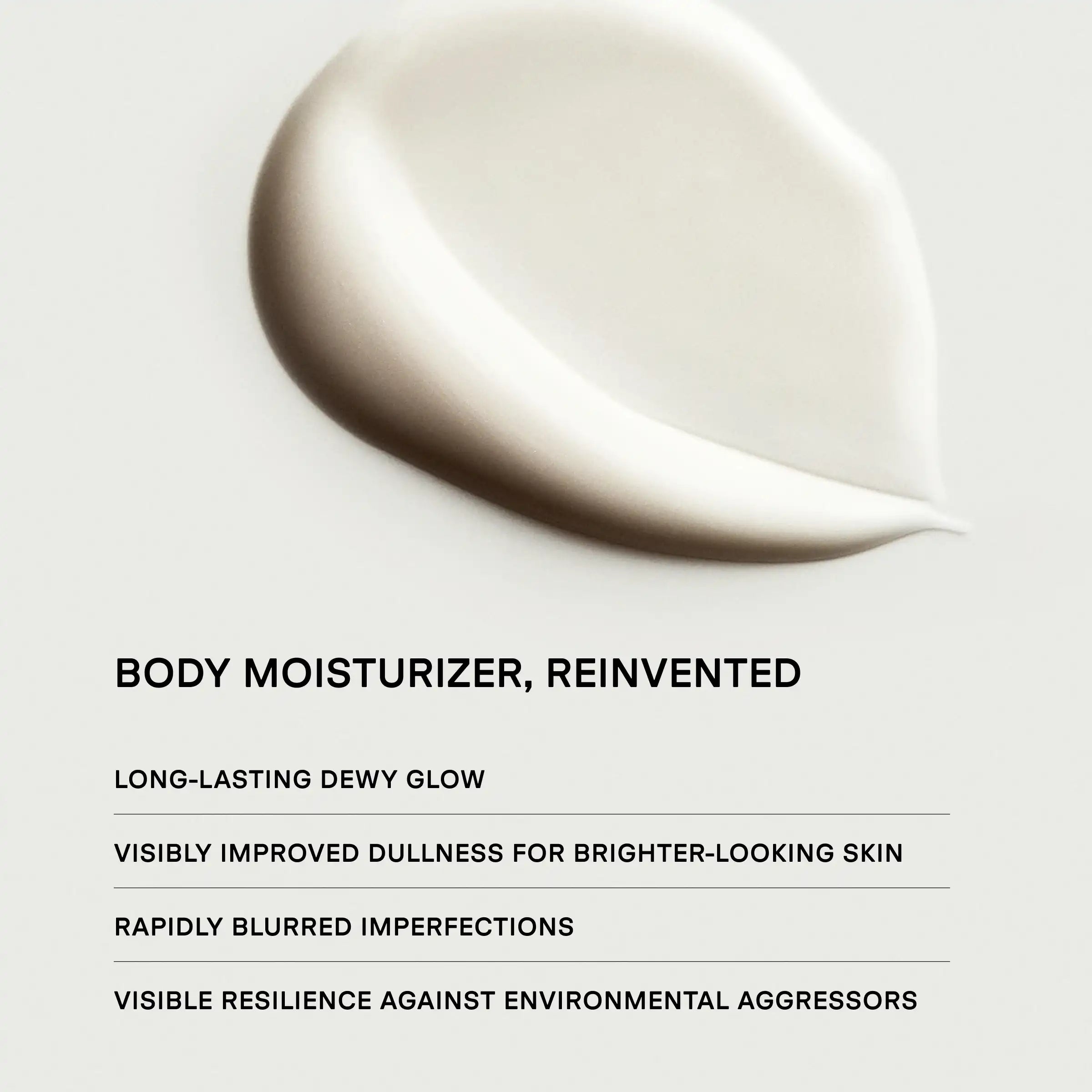 Creamy white body moisturizer with smooth, glossy texture on white background.