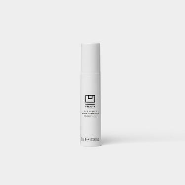 White cylindrical bottle labeled "U Beauty The SCULPT Neck + Décolleté Concentrate" with 0.33 fl oz capacity.