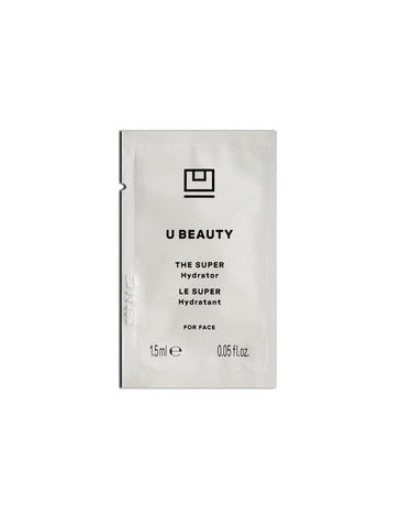 Sobre blanco con la etiqueta «U BEAUTY THE SUPER Hydrator» para el rostro, de 1,5 ml.