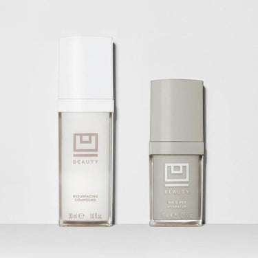 Two skincare bottles side by side: a 30ml Resurfacing Compound with white cap and a 15ml Super Hydrator with gray cap, both l