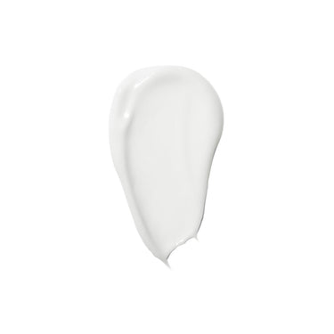 White cream or lotion swatch with curved, organic shape against white background.