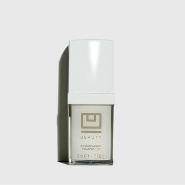 White cylindrical bottle with white cap labeled "Beauty Resurfacing Compound" 15ml, 0.5 fl oz.