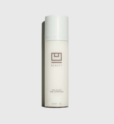 White cylindrical bottle labeled "The Sculpt Arm Compound" with geometric logo and 4 fluid ounce size marking.