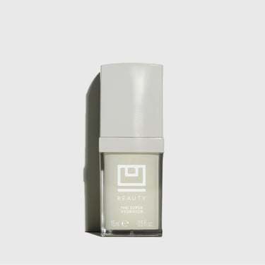 White and clear glass bottle of "The Super Hydrator" beauty serum with pump dispenser, 15ml size.